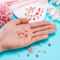 40 roze schelpkralen met bloemvorm voor sieraden maken, natuurlijke zeeschelpen in diverse maten voor creatieve en unieke handgemaakte accessoires — thumbnail 3