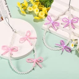 2 stuks kralen telefoonhangers met strikjes, universele esthetische delicate schattige parel strik kralen telefoon polsband voor tas camera oordopjes hoesjes decoratie (roze en paars) — thumbnail 2