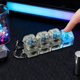 mini mechanische toetsenbord stressverlichter - Keyboard Fidget Toy - sleutelhanger -keyboard - klikje - 4-toetsen schakelaartester - Met achtergrondverlichting - Sleutelhanger -Transparant wit — thumbnail 3