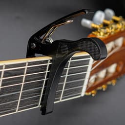 Universele Capo - Zwart - Capo Akoestische / Klassieke / Elektrische gitaar - Capo Gitaar klem — thumbnail 1