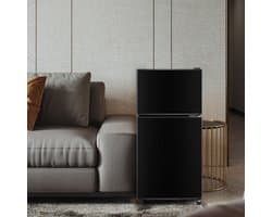 Koel-vriescombinatie, 86,8 cm hoog, 45,5 cm breed, dubbele deur, met een totaal volume van 60 liter, 22 liter vriesvolume, 38 liter koelvolume. 102 kWh/jaar, ledverlichting. Premium zwart [energieklasse E]