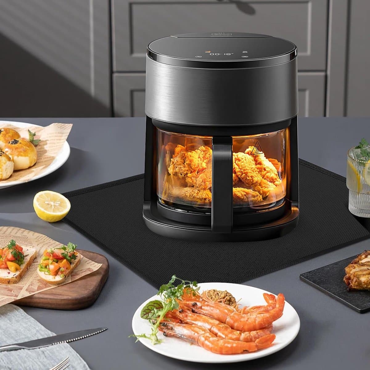 Candala Luchtfriteusemat, 30 x 45 cm - 1 mm, vuurvaste mat ter bescherming van keukenwerkbladen, accessoires voor airfryer, waterdicht, vetdicht en gemakkelijk te reinigen, zwart — afbeelding 1